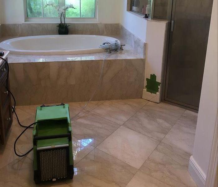 Bathroom with a dehumidifier