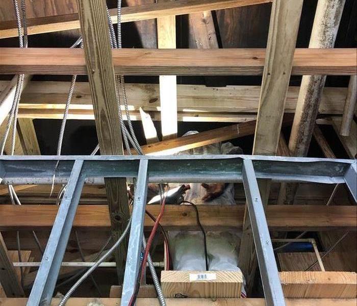 exposed wood and metal rafters
